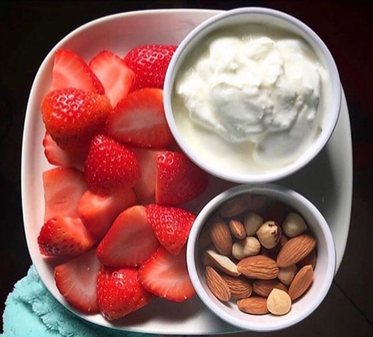 Healthy vegan breakfast with chopped strawberries, handful of nuts with vegan yogurt . Full of essential vitamins, minerals and protein. #vegan #healthy #food #lifestyle #nodrugs #nowar #cleaneating
