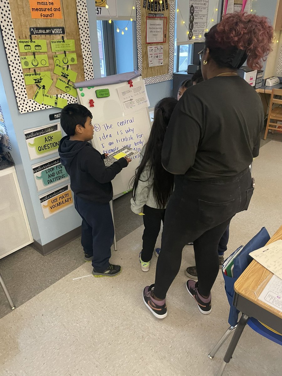 Class 302 is getting ready for the state test by engaging in a gallery walk to determine short response success criteria! @PS66JKO