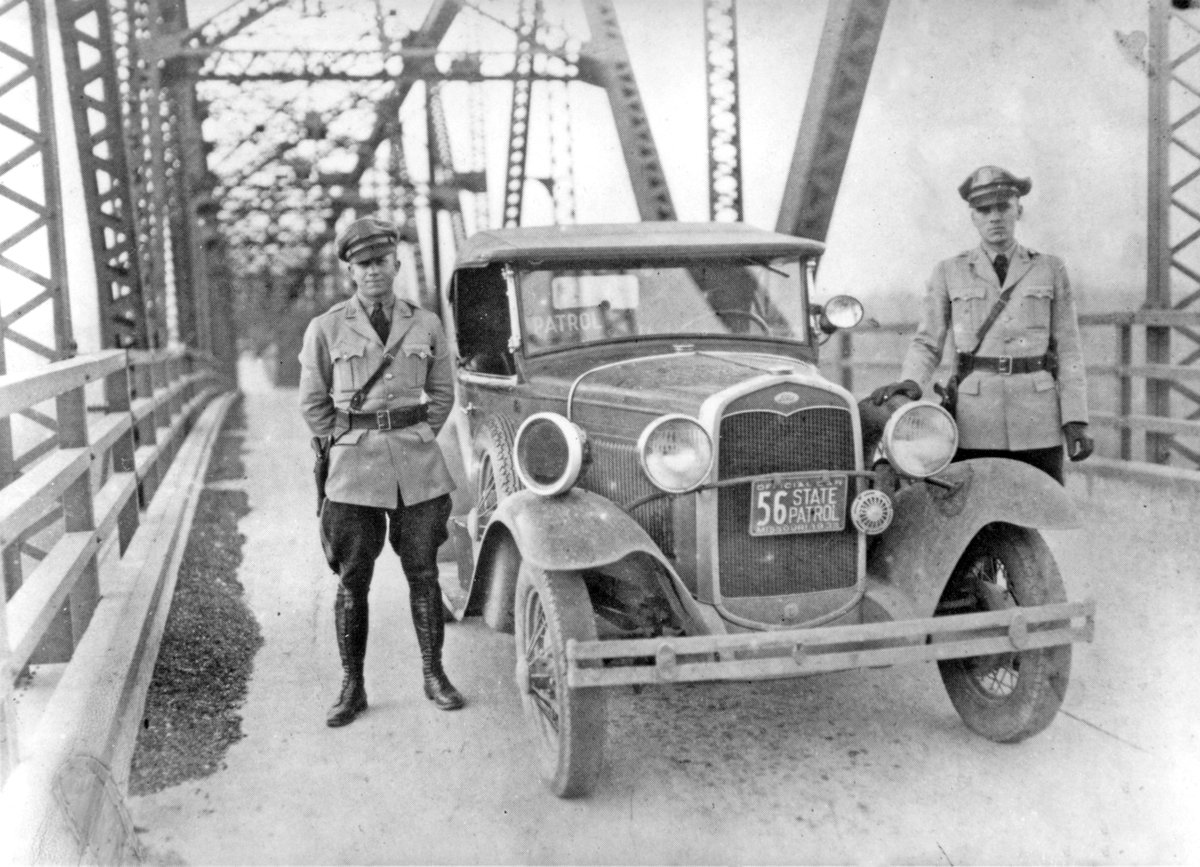 Trooper M. Dace and Trooper J.A. Tandy (right) stand next to a 1932 Ford Model A. #TBT