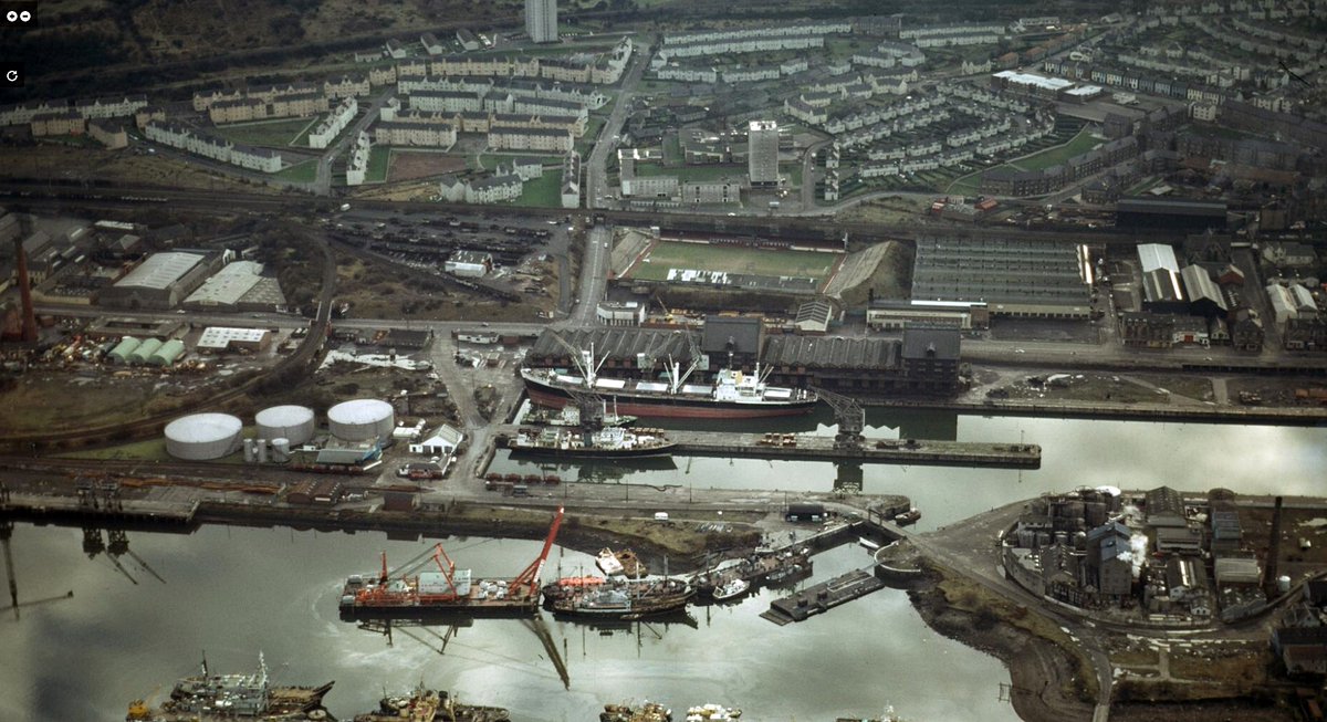 #ThrowbackThursday Superb photos of Great Harbour and James Watt Dock both taken in 1974 capturing the busy productive area at that time. ⛓️🏗️⚙️🌊⚓️ Photo Credit: Tommy Leith. More great images can be found on this group: facebook.com/photo/?fbid=77…