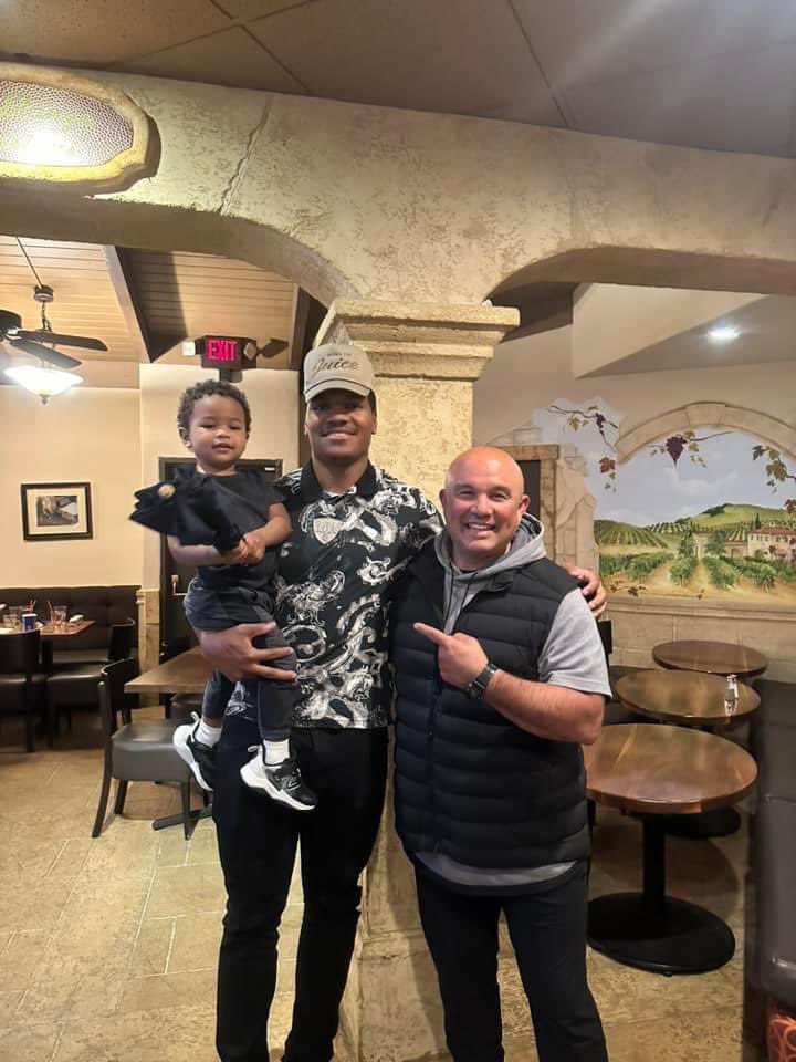 Coach Pop with Mykal Walker and his family. Love how our alumni stay in touch and keep us up on their life journey. It is more than just the sport….Bulldog Famiily🧡