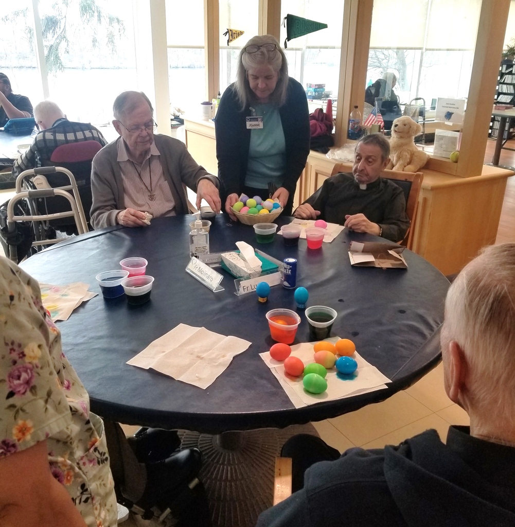 The men at Holy Cross House, with assistance from Director of Nursing Jeanne Harrison and Life Enrichment Director Katrina Marigold, decorated eggs for Easter. #holycrossus Pictures courtesy of Shannon Kelley, volunteer coordinator, scheduling, and purchasing.