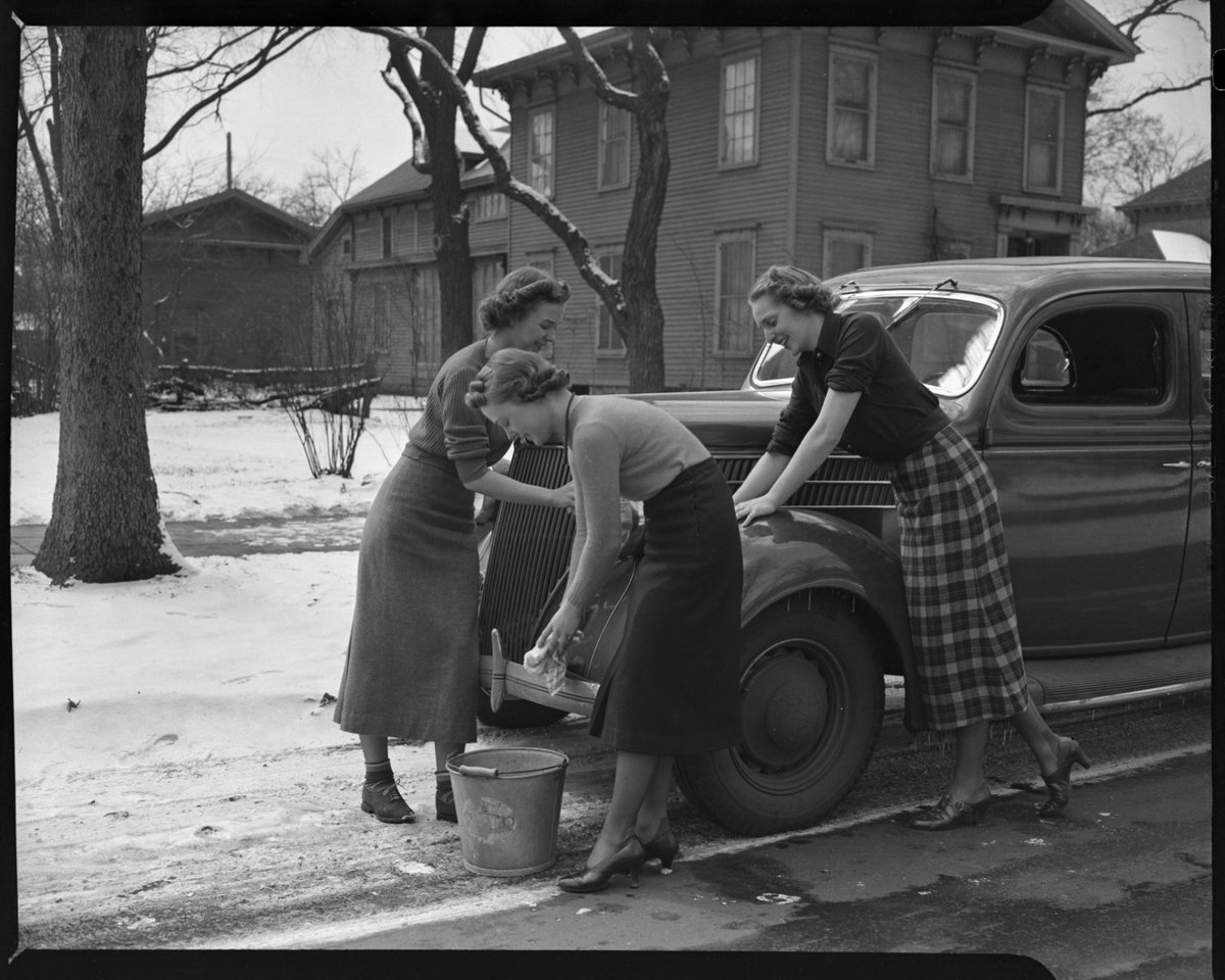 You know the weather is getting warmer when people start washing their cars outside! With these unseasonably warm temperatures, it's safe to say that the women in this photograph from 1937 had the right idea.