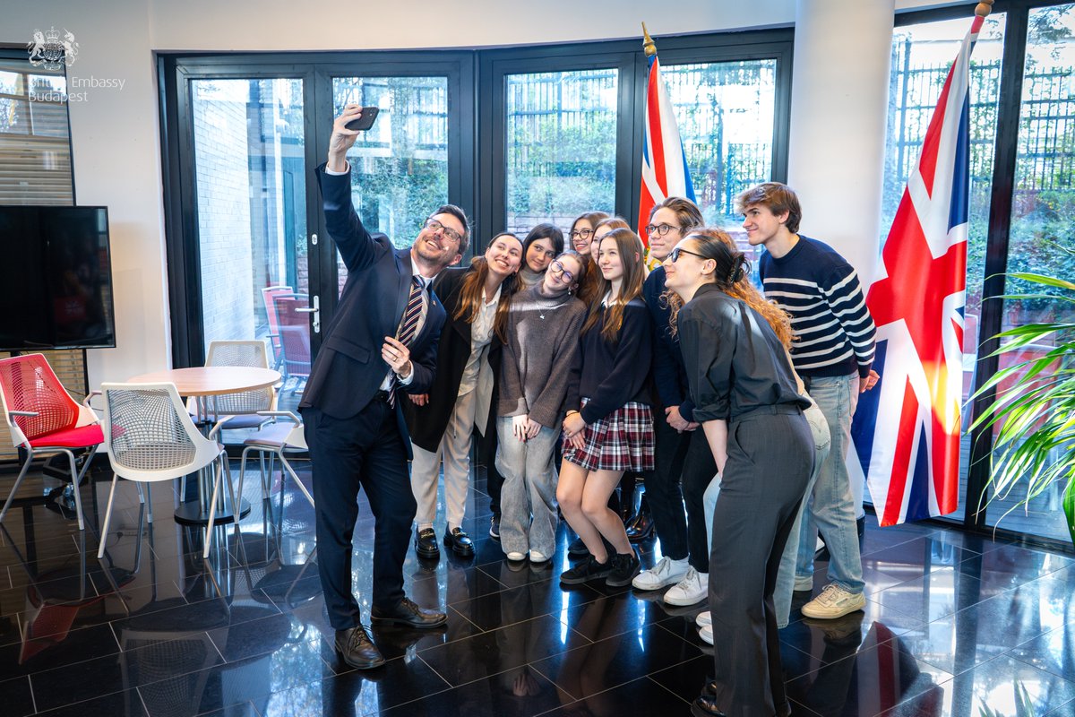 ukinhungary's tweet photo. Students from @engameacademy & @uni_nke visited us to learn about the Embassy’s work first-hand. They sat down with 2nd Secretary Leslie Hayler and Education & Culture Policy Officer Zsófia Oberle who gave them an overview of His Majesty’s #DiplomaticService & life in an embassy. https://t.co/tgygYgbVLm