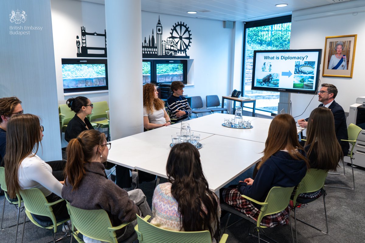 ukinhungary's tweet photo. Students from @engameacademy & @uni_nke visited us to learn about the Embassy’s work first-hand. They sat down with 2nd Secretary Leslie Hayler and Education & Culture Policy Officer Zsófia Oberle who gave them an overview of His Majesty’s #DiplomaticService & life in an embassy. https://t.co/tgygYgbVLm