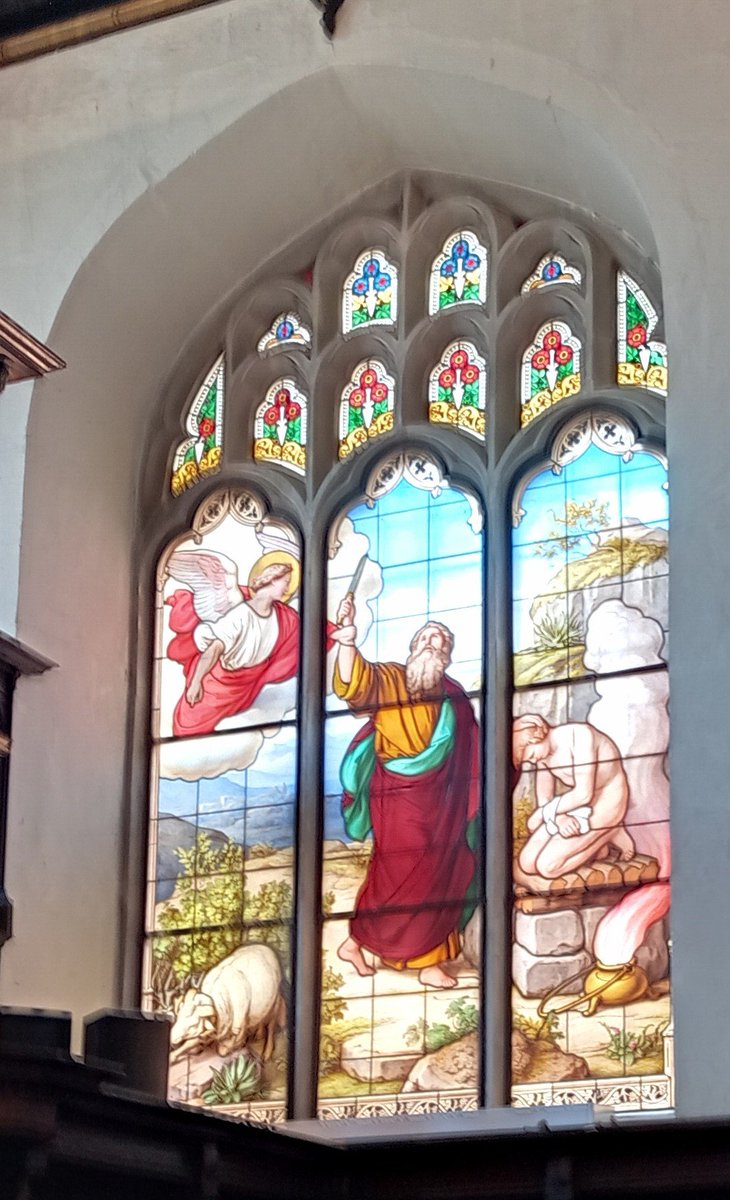 Window 1, Peterhouse College chapel, Cambridge. +-2000 years before Jesus and this foreshadowing of the crucifixion. Abraham about to make the costly sacrifice of his son but is stopped by an angel. God provides a substitutionary lamb for the sacrifice instead.