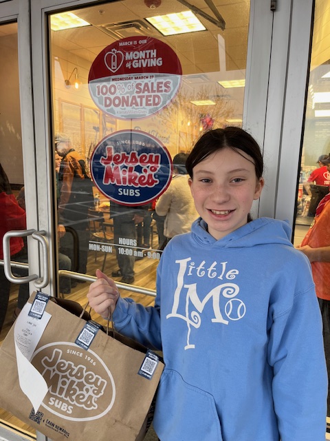 Alix with her order from Jersey Mike's Sub on their Day of Giving! Thanks for sharing.