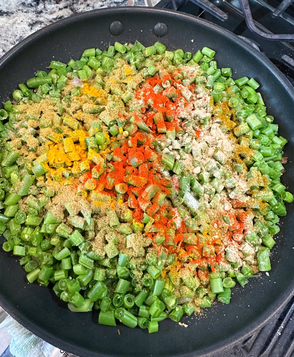 One of my favorite parts about cooking is when I get to add the spices. The color and the aroma change is so satisfying! 

#twittersupperclub
#greenbeans #spices #turmeric #coriander #chilies #garammasala #cooking #homecooking #aroma