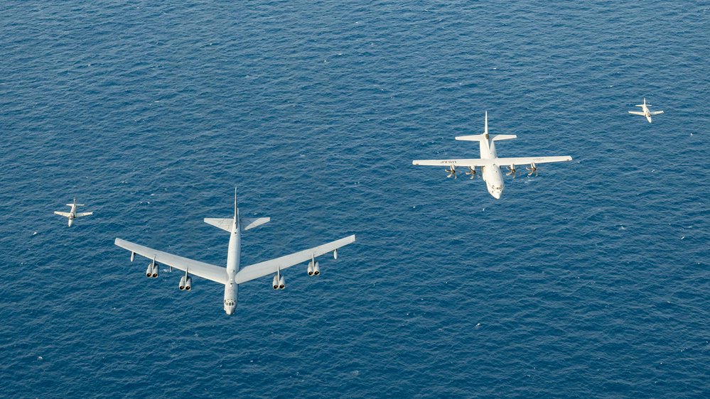 A B-52, and C-130J-30, fly in formation with 2 Indian MK-132, in the Bay of Bengal, Mar. 28, during Exercise Tiger TRIUMPH 2024. Tiger TRIUMPH is a U.S.-India tri-service amphibious exercise focused on humanitarian assistance and disaster relief readiness and interoperability.