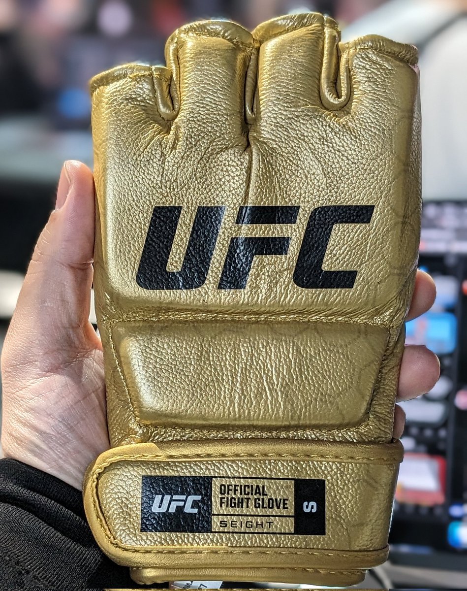A close up look at the new Gold UFC Championship Gloves 🏆