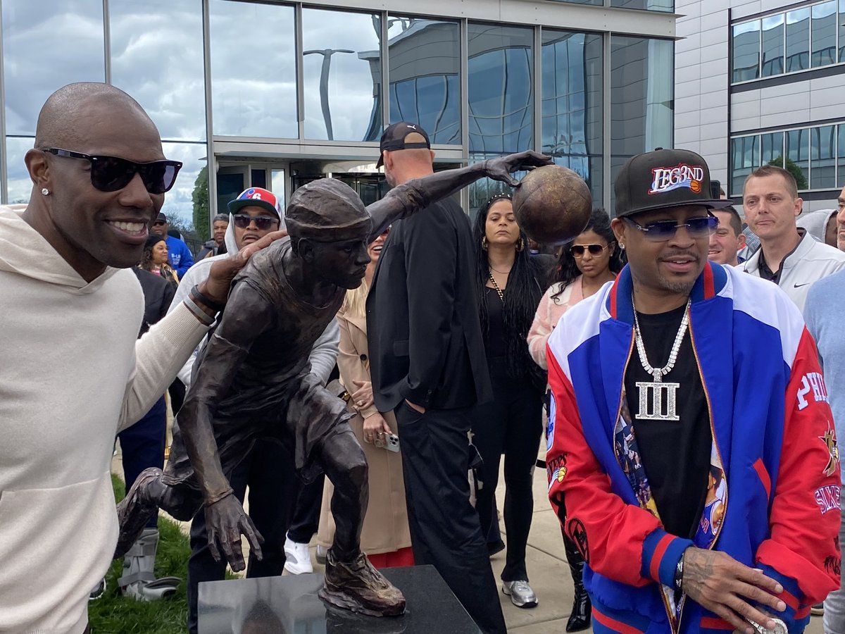 Allen Iverson and TO by the new statue of The Answer