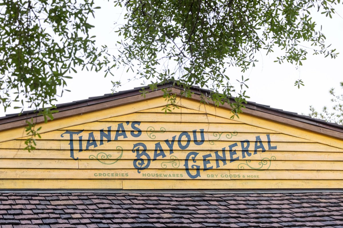 Disney shared two new merch locations coming to Tiana's Bayou Adventure at Magic Kingdom & these they got right! Critter Co-op is charming & follows the spirit of Splash & Tiana's Bayou General is era-appropriate. That's what the Tiana's Food sign should look like on the barn