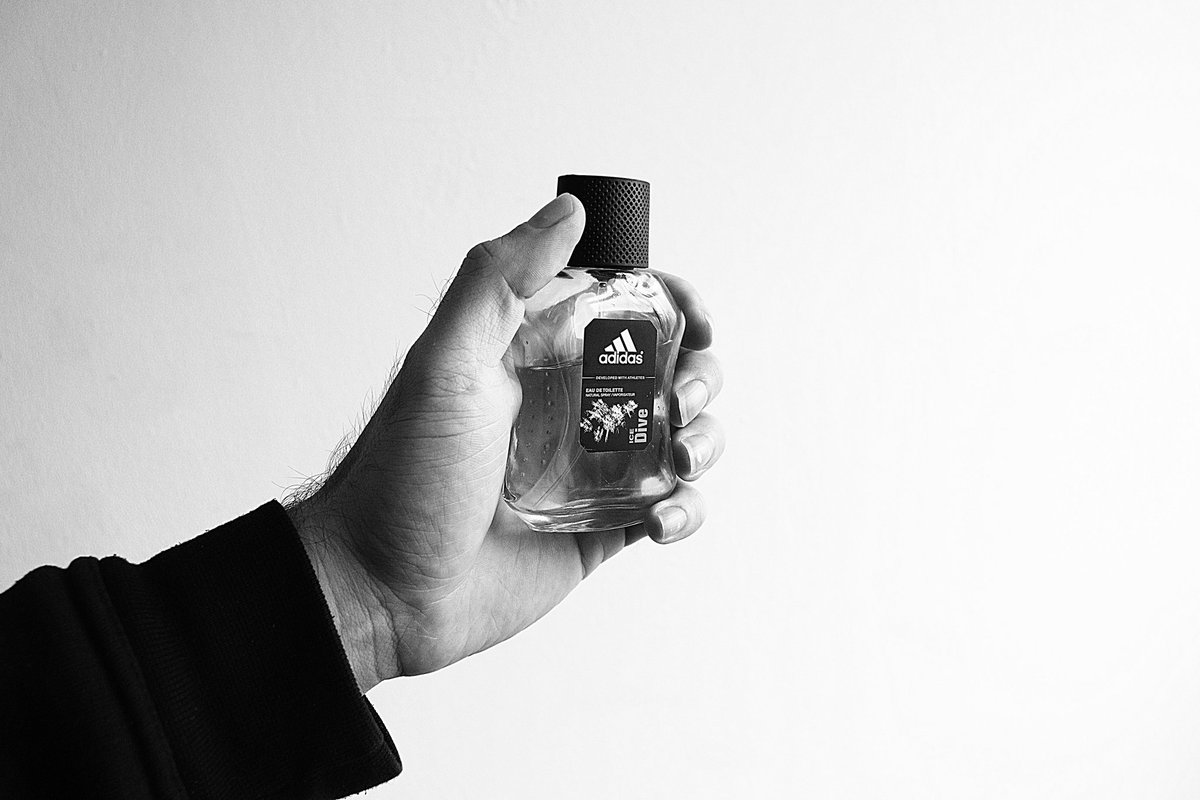 A photo of my hand and a small bottle of eau de toilette.

#hand #hands #eaudetoilette #eaudetoilettebottle #eaudetoilettebottles #Adidas #photography #photograph #photographs #photo #photos #blackandwhite #blackandwhitephotography