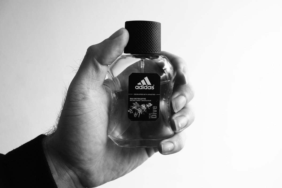 A photograph of my hand and a small bottle of eau de toilette.

#hand #hands #eaudetoilette #eaudetoilettebottle #eaudetoilettebottles #Adidas #photography #photograph #photographs #photo #photos #blackandwhite #blackandwhitephotography