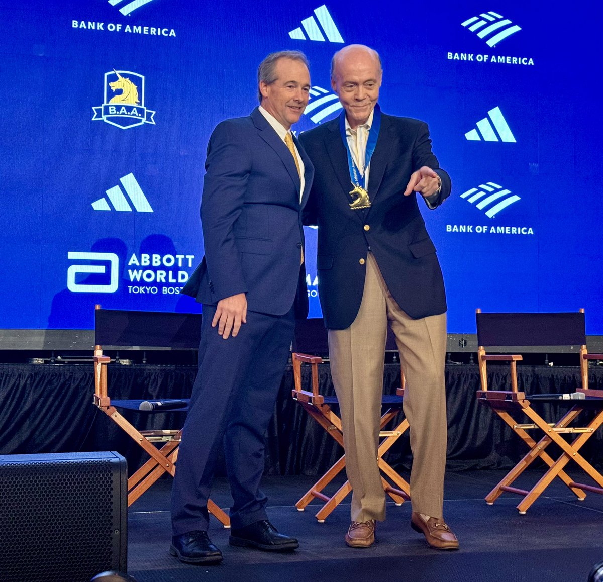 Incredible: Larry Rawson (right) will be calling his 50th #BostonMarathon from the broadcast booth this year via the world feed. @BAA presented him with a special award. 📷 @JaneMonti1