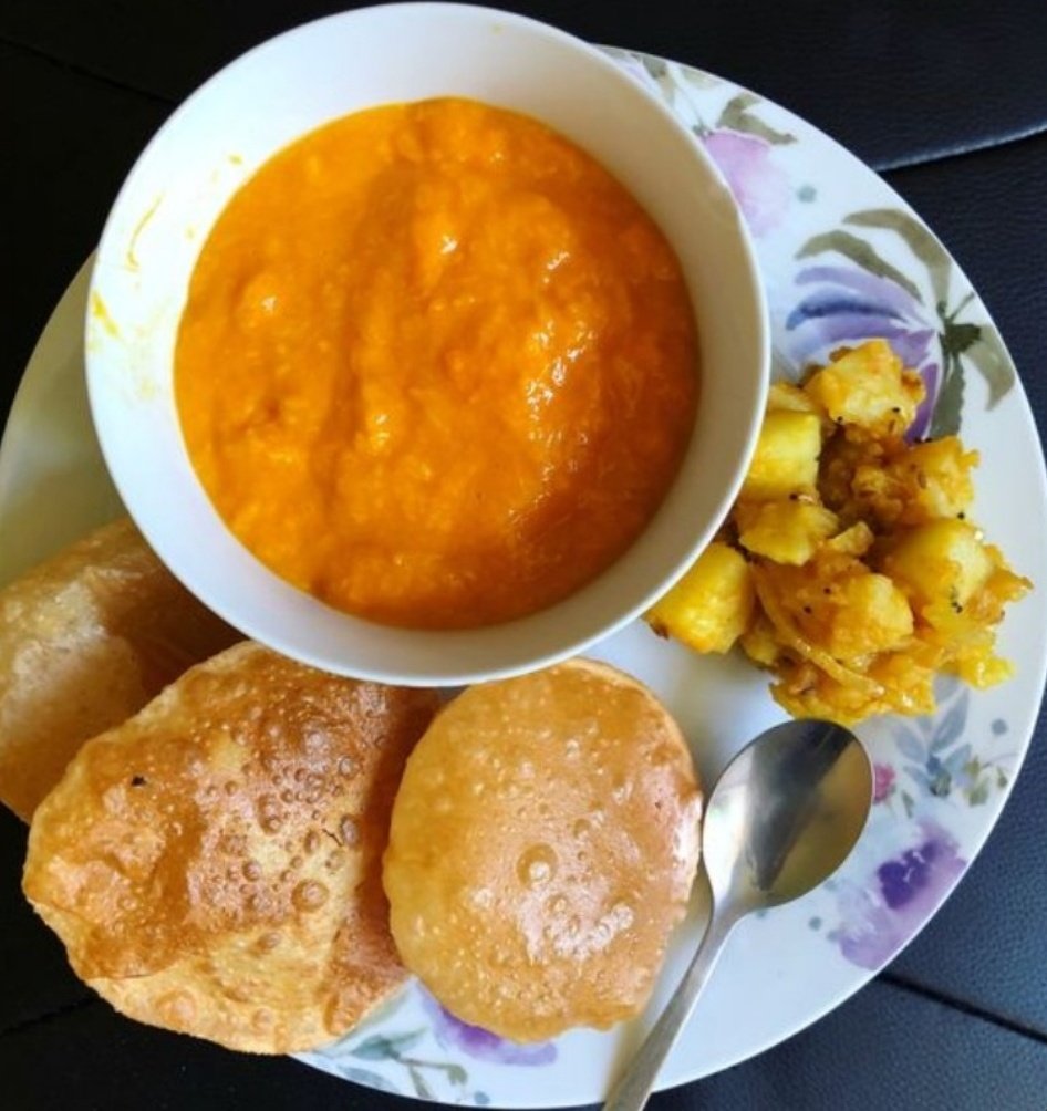 Aamras Poori I am craving for this 🤗 Never tried but, I think it tastes like khatta, meetha and masaledar all once