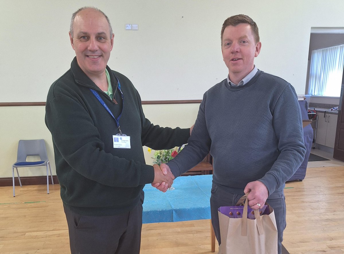 Dementia Adviser Howard gave an awareness presentation to the luncheon club at Ballykelly Presbyterian Church. Here he is being presented with a small token of appreciation from Minister Phil Houston who thanked Howard for the informative talk.