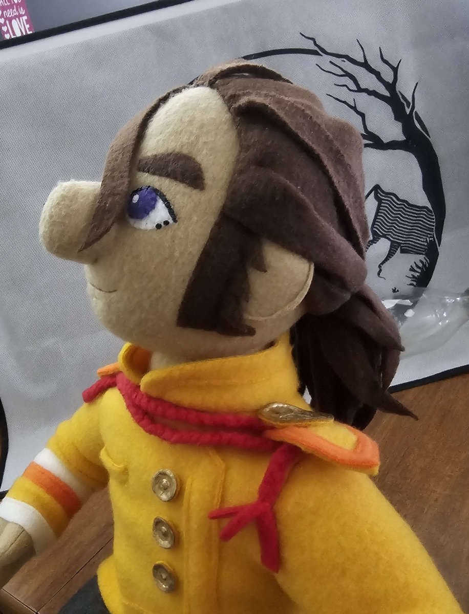 Had to tie his hair back with an actual hair tie so that it'd stop tickling me everywhere whenever I tried to snuggle him. 🤣

Waiting for the weather to clear to take some better photos of my Miguel plushie. 🥰

#MyTimeatSandrock #MTAS