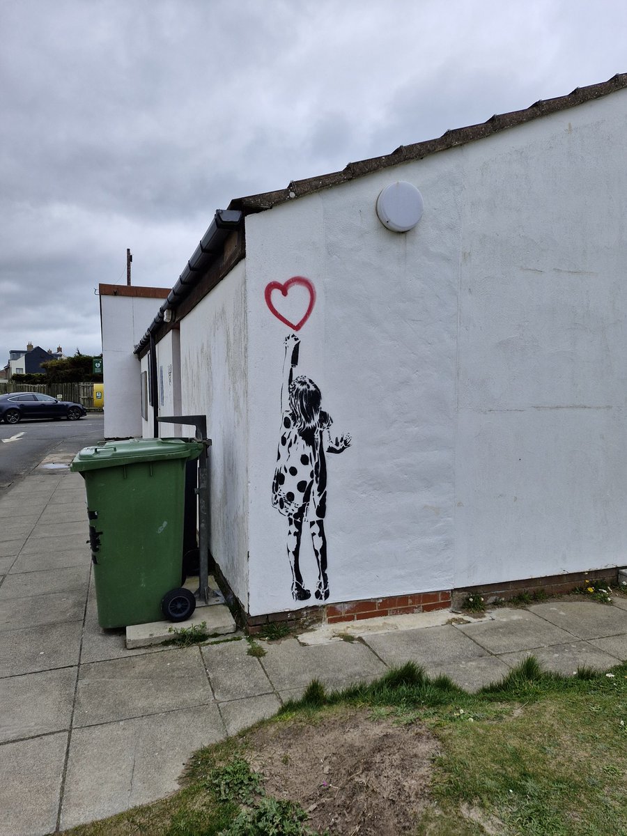 Is this a Banksy on Beadnell Beach car park toilet block?