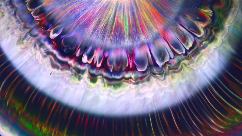 Brightly colored paints and inks mix and flow in artist Roman De Giuli's 'Color Show.' De Giuli typically creates this fluid art in thin layers atop paper. He's a master of the form, manipulating surface tension gradients to create streaming flows. fyfluiddynamics.com/?p=20665