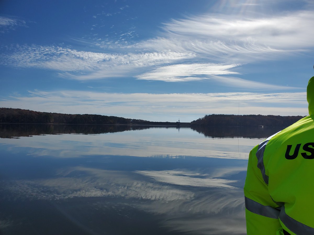 Hydrologic Technician Eric Von Amsberg took a boat to a sampling site on the Haw River arm of B. Everett Jordan Lake. The Dam is pictured here. 📸 Ryan Rasmussen. To see the data, click ow.ly/7YFr50R9J2j. #FieldPhotoFriday