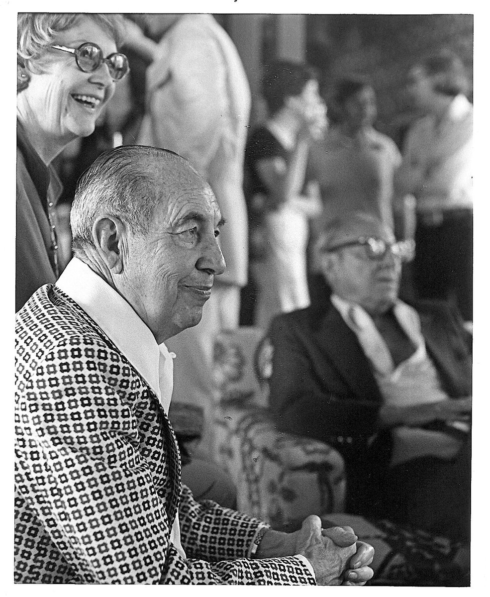 Gummo enjoying his older brother's 85th birthday party in 1975. That's Zeppo seated, with glasses. The blurry figure above Zeppo's head is me, between Sheila from Groucho's accountant's office and my roommate Daryl. Don't know who the woman is behind Gummo - possibly his wife.