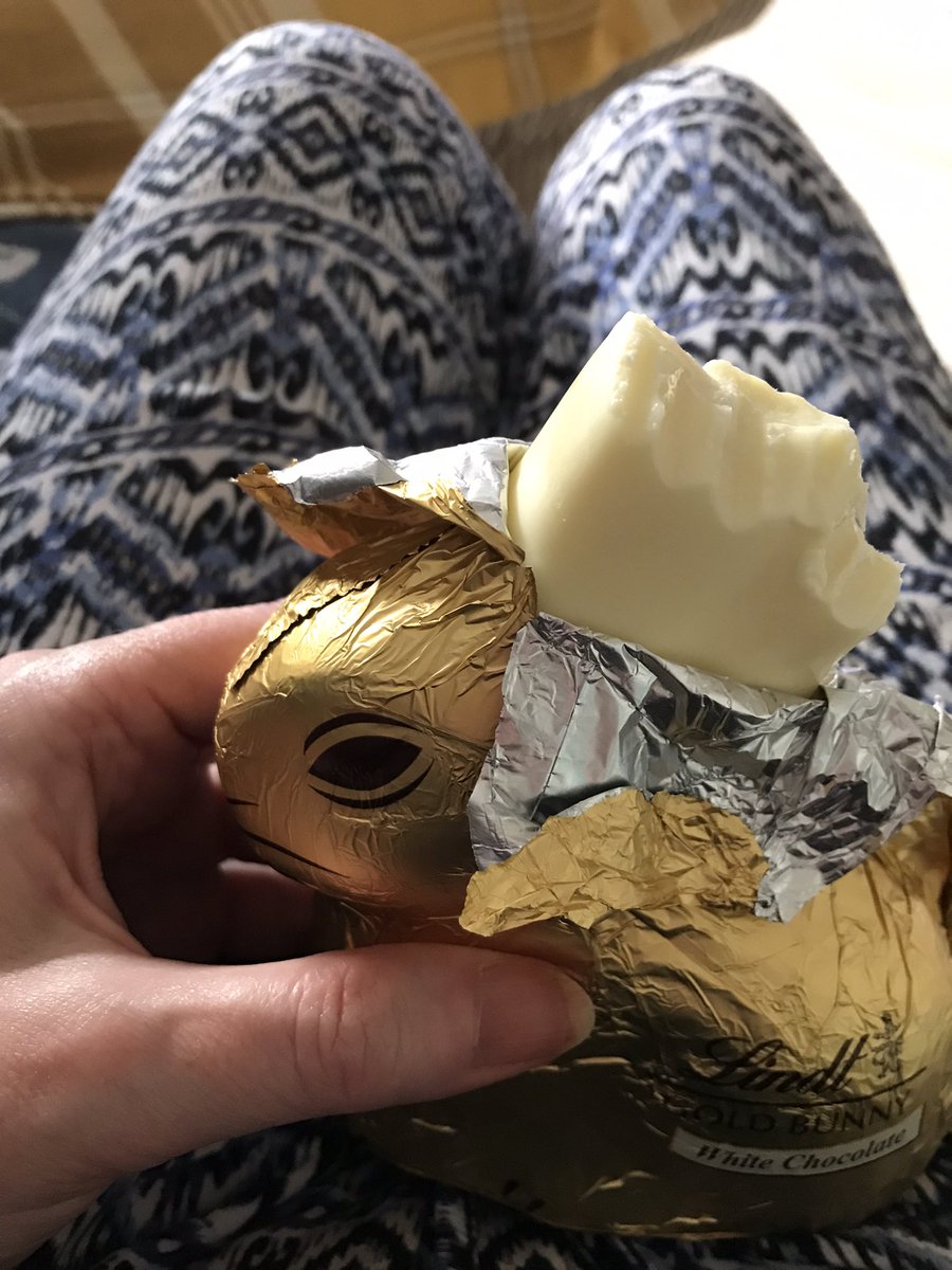Tackling my Lindt bunny. Chocolate ears are very thick!