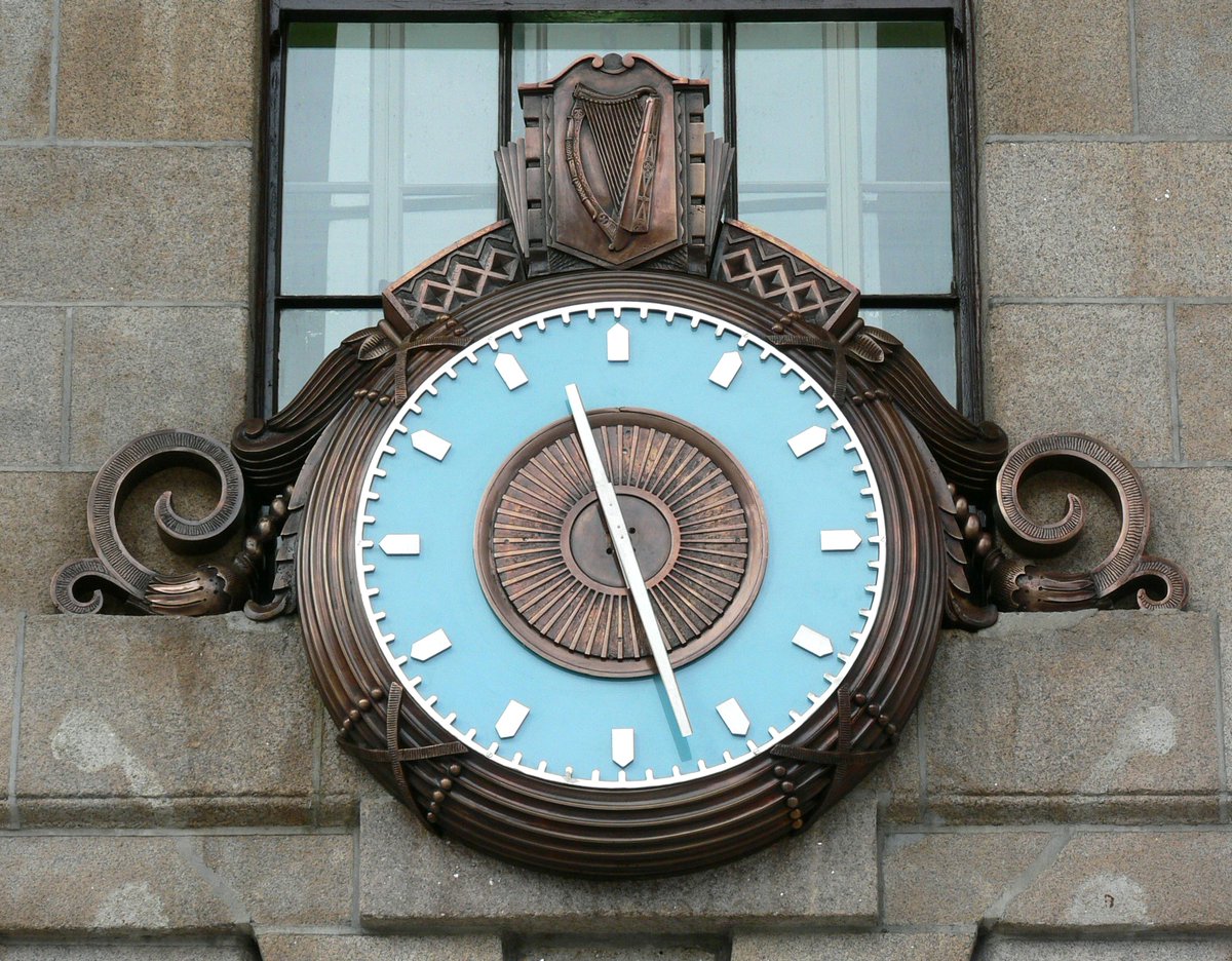 The clock at Dublin's General Post Office, likely dating to 1929, bristles with enrichment, from Roman ribbon-and-reed framing to jazzy Deco fans and zigzags - all sobered up in bronze casting. The St. Patrick's blue back-lit glass is a delightful product of recent conservation.