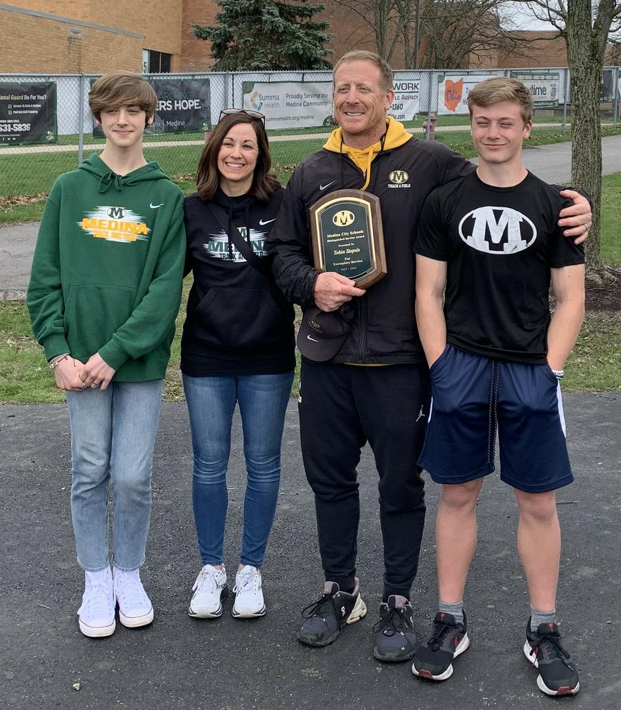 Congratulations to Toby Stepsis, a health teacher, track coach, and a football coach at Medina High School, who received the Distinguished Service Award. This is the highest honor bestowed upon a Medina City Schools staff member.