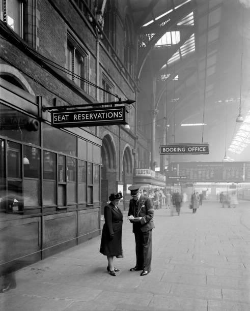 An atmospheric photograph of Liverpool Street Station, taken in 1950.