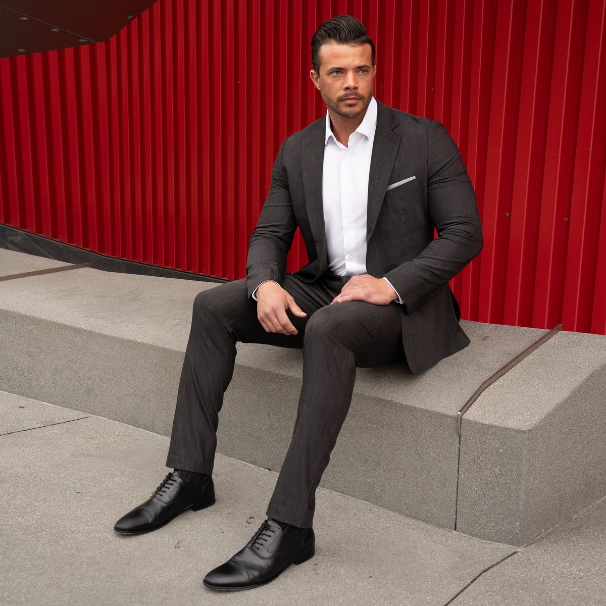 Elevate your business attire game with our new Heathered Charcoal ready-to-wear suit. Engineered from a performance fabric blend that offers unparalleled stretch while maintaining a sharp, professional appearance. From the boardroom to after-work gatherings, make a statement…