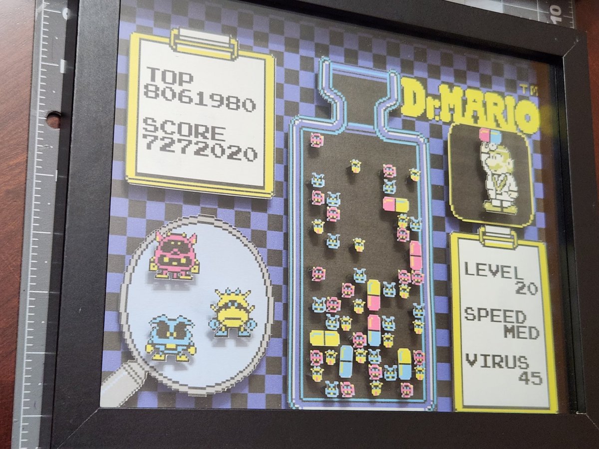Really cool custom Dr. Mario shadowbox we made a while back! 
Took about 1.5 hours pasting each piece on the bottle 🧑‍⚕️

#etsyshop #EtsySeller #DrMario #NintendoArt