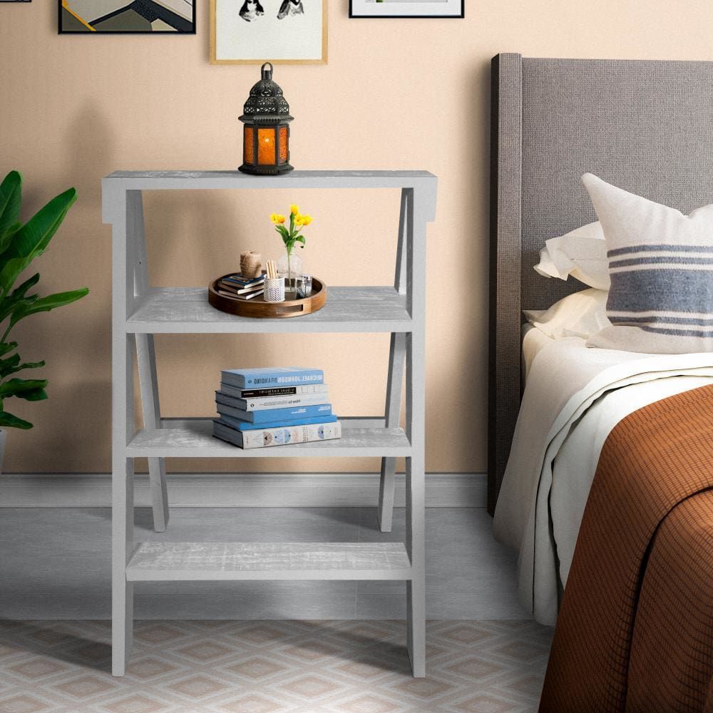 Emanating a subtle coastal flair, this ladder bookshelf depicts fine craftsmanship. Shop Now👉 buff.ly/3PUW9UN . #ModernDecor #InteriorDesign #GlassFurniture #ContemporaryStyle #HomeDecor