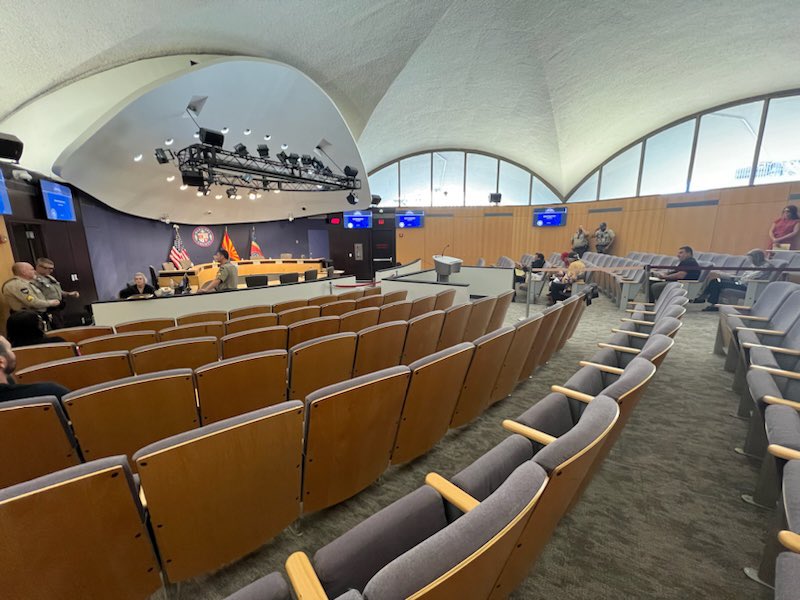 The new set-up of the Maricopa County Board of Supervisors includes a pony wall around the podium by members of the public. It is intended to help prevent the types of disruptions and harassing behavior that the board has experienced off and on since 2020.