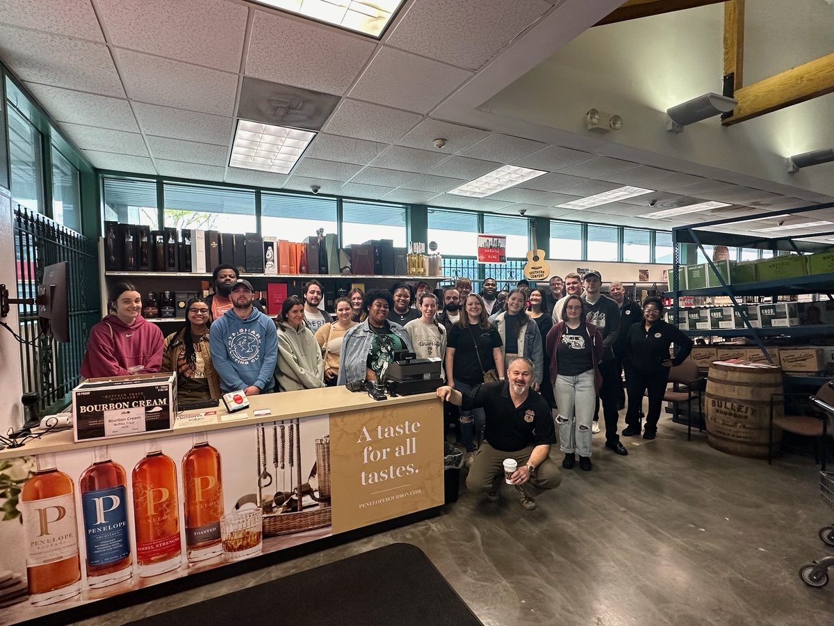 Sr. Officer Scott Minderlein with his class from Johnson & Wales University at Mecklenburg County ABC Board's mixed beverage-only store. The class participated in week-long activities about our operations, prevention, and ASSET (Alcohol Seller/Server Excellence Training) classes.