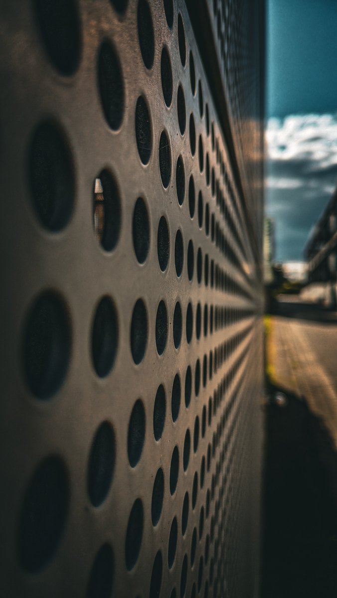 Perforated metal wall in the city 🕳️ #wall #metal #city #urban #photography