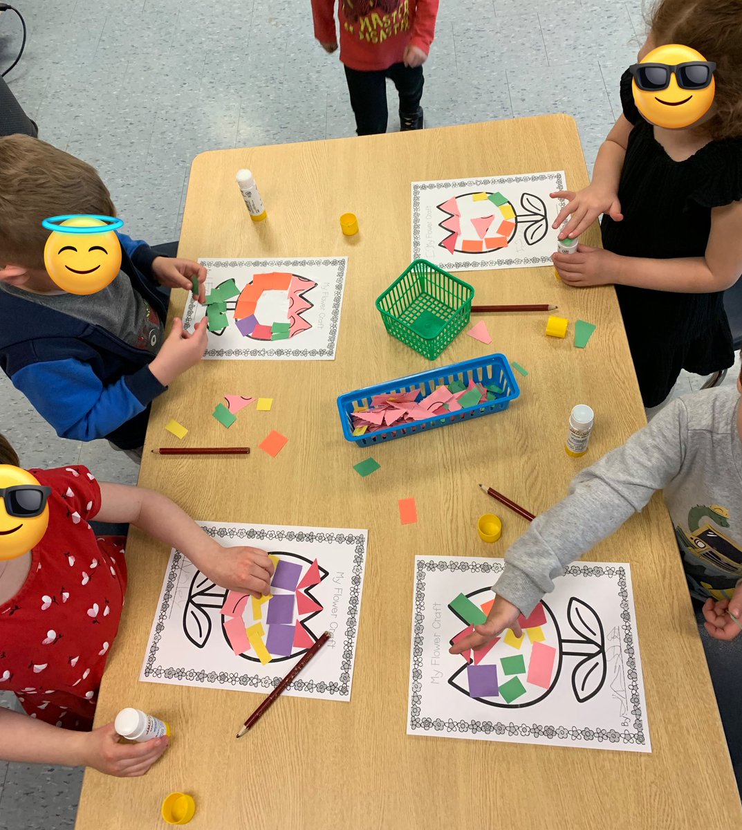 Working on our fine motor and pasting by creating some spring flowers