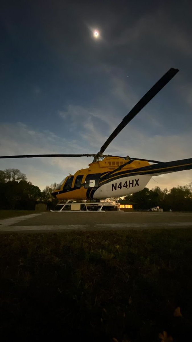 HotshotWake's tweet photo. The Clarksville helibase, Ozark National Forest during the eclipse.

Incredible. 

Thanks to the subscriber that shared this beautiful view. 🙏 
#arfire #aviation #wildfire https://t.co/6YnIcZQQUd