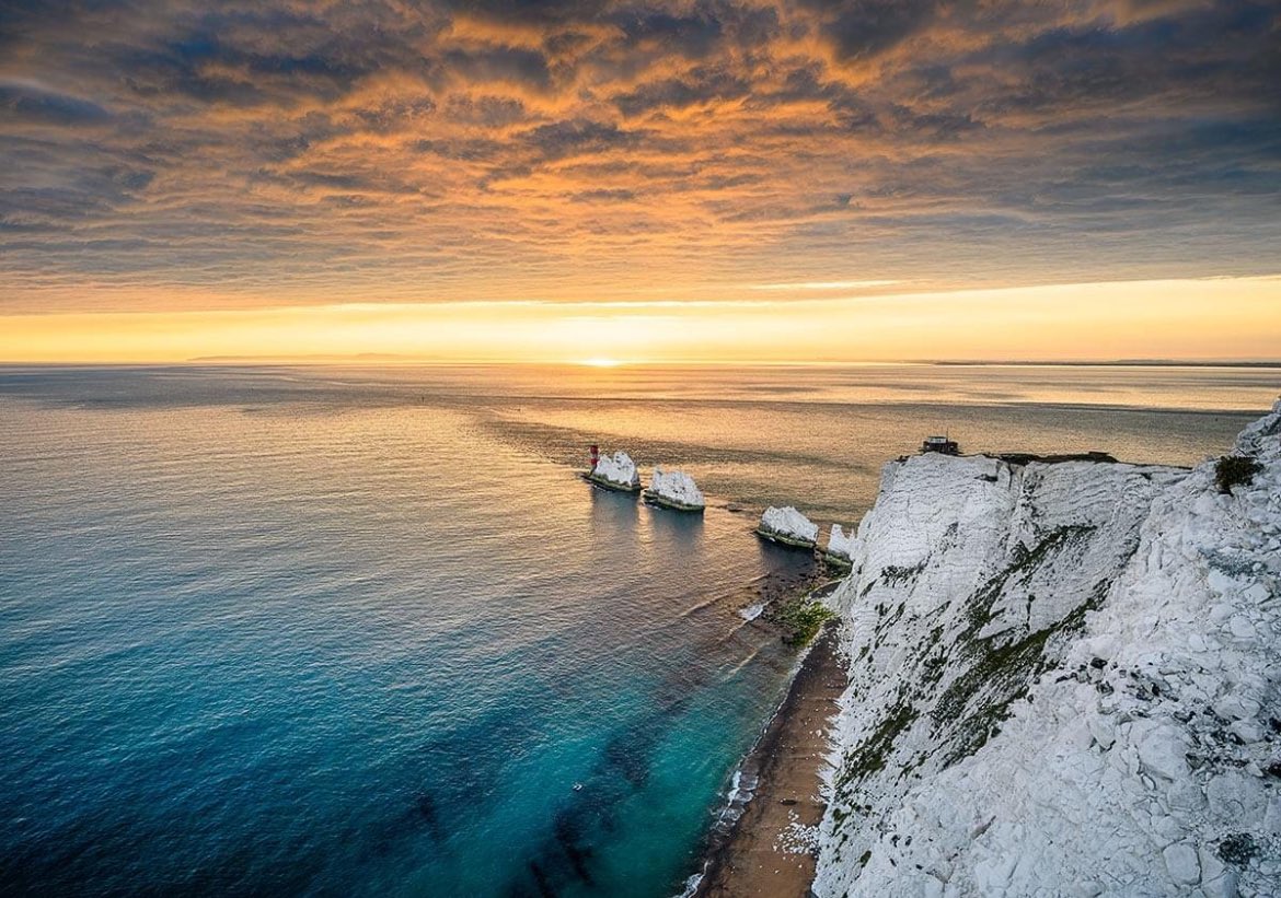 Boom 💥. Brilliant photograph from @Availablelightp of @VisitTheNeedles This is from their calendar 2025 which you can now preorder. Sadly this is not my birthday month September but you can find this image on August. @VisitIOW @UnlimitedIsland @RedFunnelFerry @wightlinkferry
