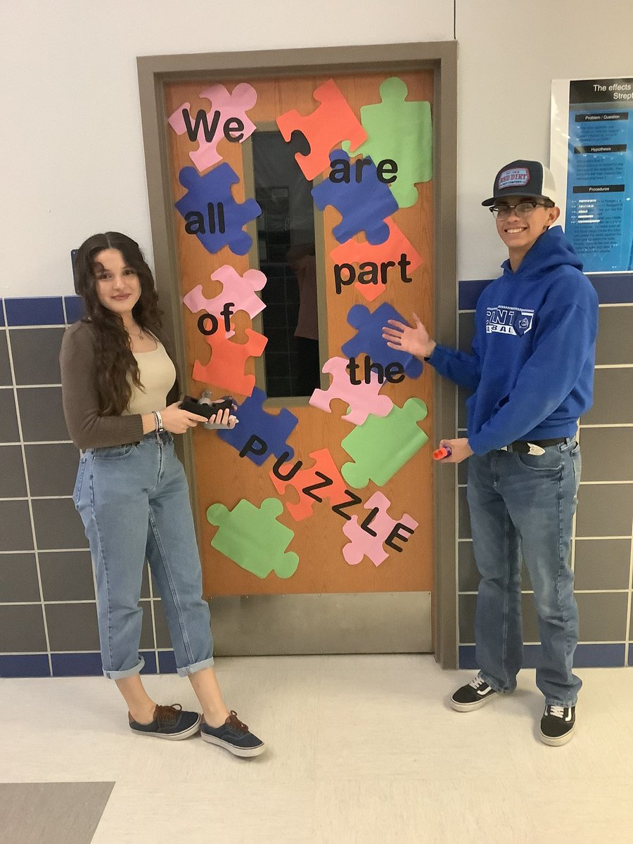 Peer Tutors helping out with the details on door design for Autism Awareness.  Great job!!!!  #AutismAwareness @ClintHSLions @ClintISD