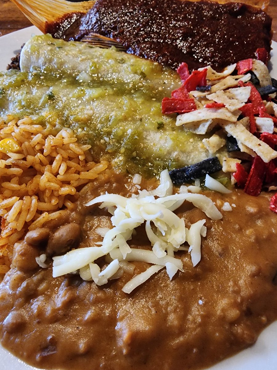 Lunch combo of pork tamale and chicken enchiladas with verde sauce from No Mas