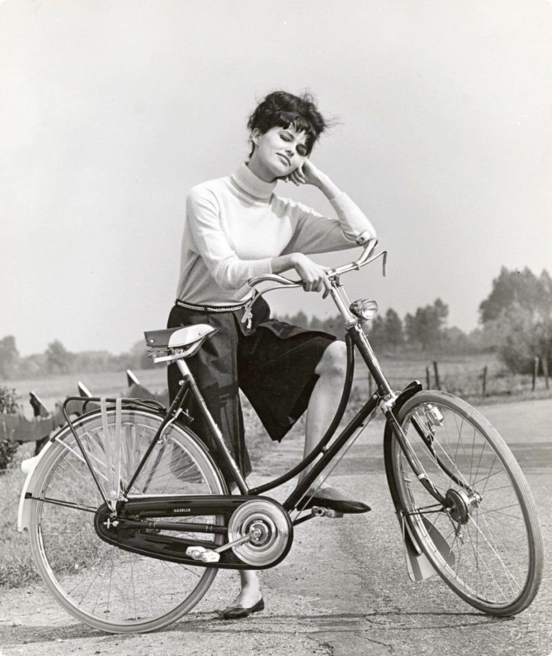 Born on this day, April 15, 1938: Claudia Cardinale, actress, here illustrating that a Dutch bike, a skort, and a turtleneck are all anyone really needs to have a good time. Happy #BicycleBirthday, Claudia!