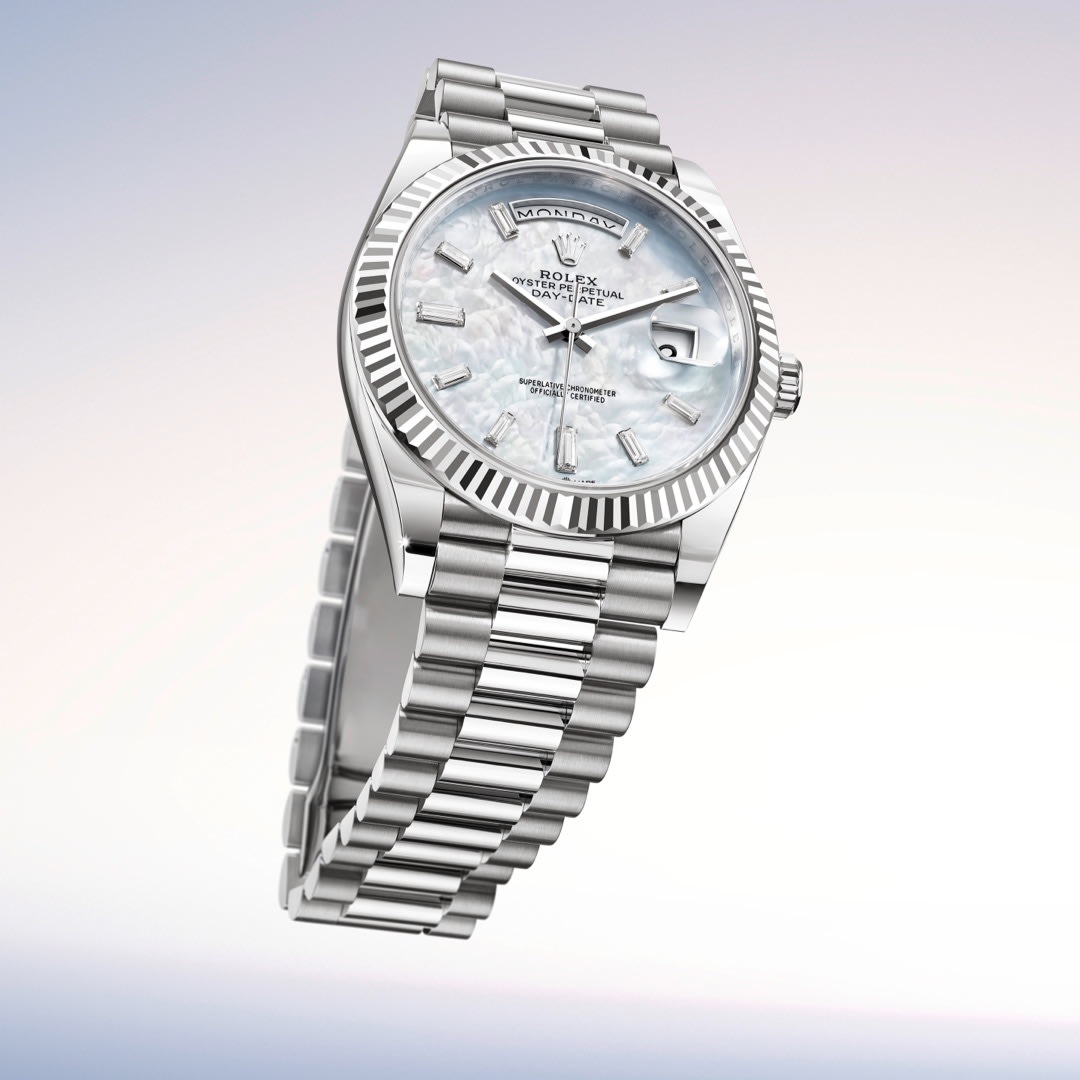 The new Rolex Day-Date 40 in 18 kt white gold featuring a pearlized mother-of-pearl dial with ten diamond hour markers, a fluted bezel, and a President bracelet.

#Rolex #DayDate #WatchesandWonders2024 #WatchesAndWonders #BrombergsWatch