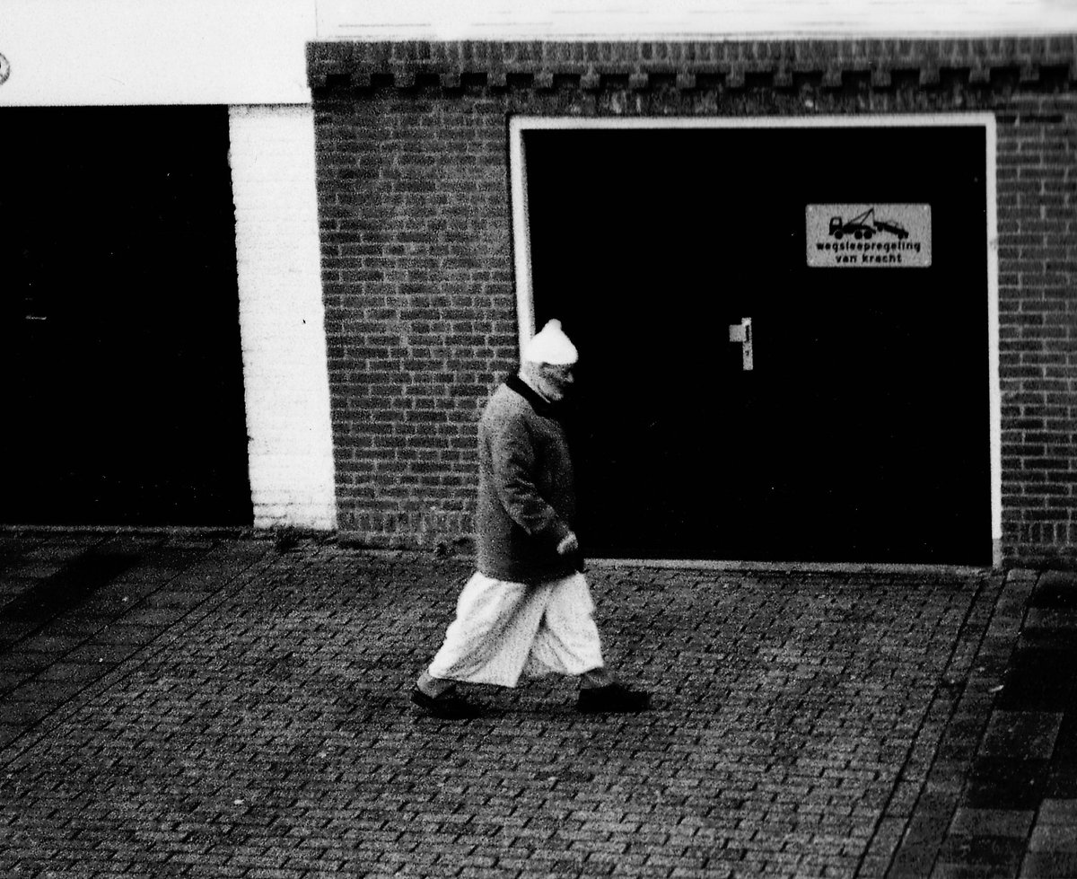 An analog photograph I took 12 years ago of a man going home after celebrating eid ⚪️