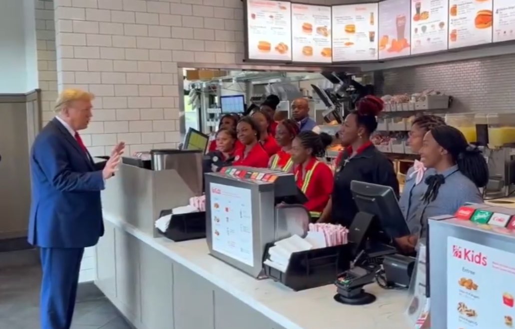 It is unreal how often Trump, just by existing, gives us photographic renaissance paintings. He's the most famous person on Earth, which makes the everyday surreal. Here, at a Chick-fil-A while campaigning in Georgia. I'm speechless