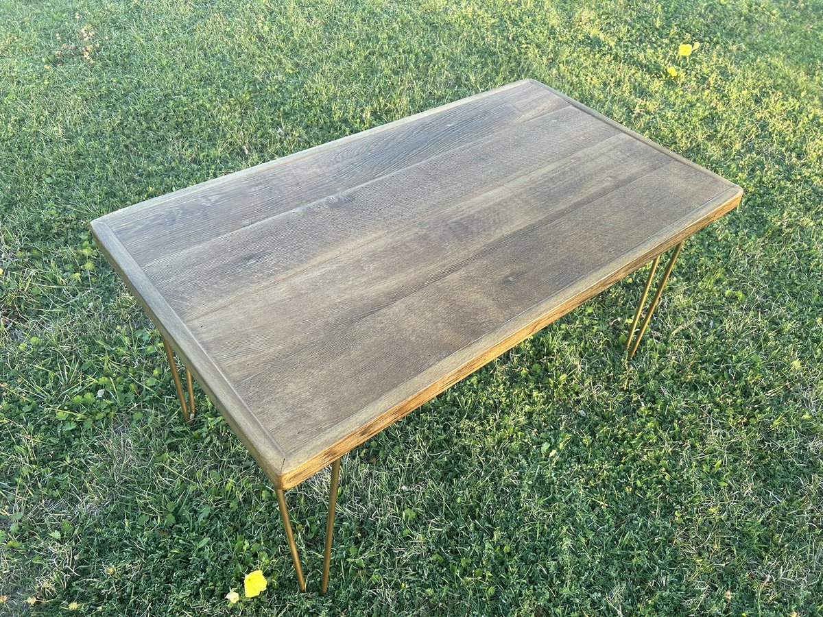 The Colorado is a low profile coffee table made from 6”W reclaimed cedar planks with a 1.5” thick frame around it. Stained with golden oak and sealed with 3 coats of poly. Gold hairpin legs too! #colorado #reclaimedwood #wobblyknobwoodco #coffeetable #gold #handmade #farmhouse