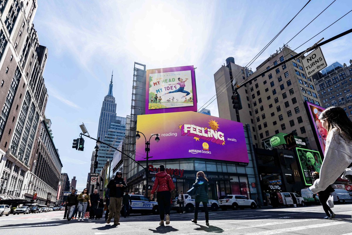 .@Aly_Raisman’s children’s book, From My Head to My Toes shines bright today on the @amazonbooks billboard in NYC. 📖✨