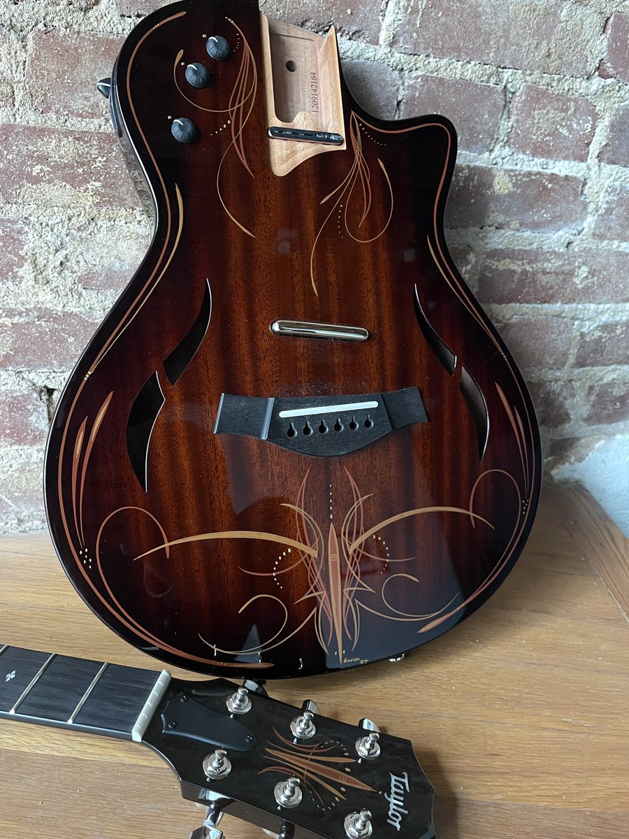 michael_swann's tweet photo. Take a look at this Taylor guitar I recently pinstriped. #taylor #guitar #pinstriping #taylorguitars https://t.co/6H9wVTmw23