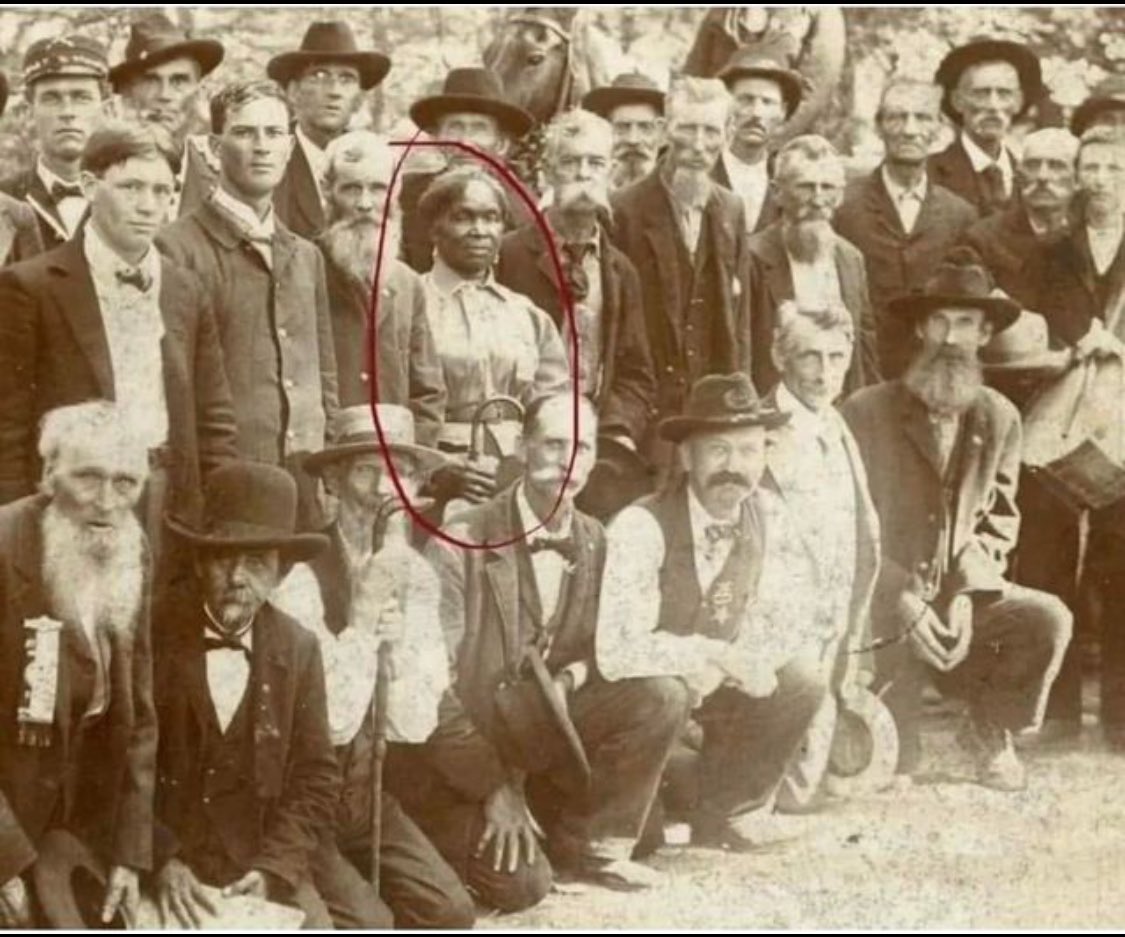 The woman highlighted in red is Lucy Higgs Nichols. Born into slavery in Tennessee, she managed to escape during the Civil War and eventually found her way to the 23rd Indiana Infantry Regiment, which was stationed nearby. Nichols remained with the regiment and served as a nurse