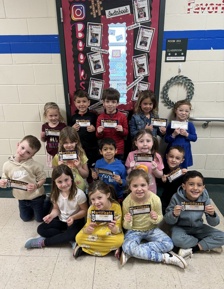 Mrs. Angiolino’s K @SBS_Tigers, the winners of our #ReadAcrossAmerica door decorating contest, are excited to receive their @YESTERcades gift cards from the @ShrewsburyPTA!